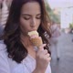 Beautiful Brunette Woman Eating Delicious and Sweet Ice Cream - VideoHive Item for Sale