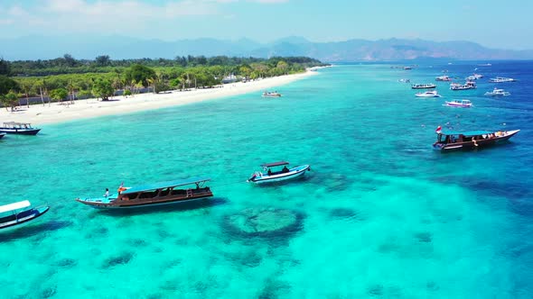 Aerial nature of tranquil tourist beach vacation by blue lagoon with white sand background of advent