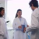 Scientists Shaking Hands in Laboratory - VideoHive Item for Sale