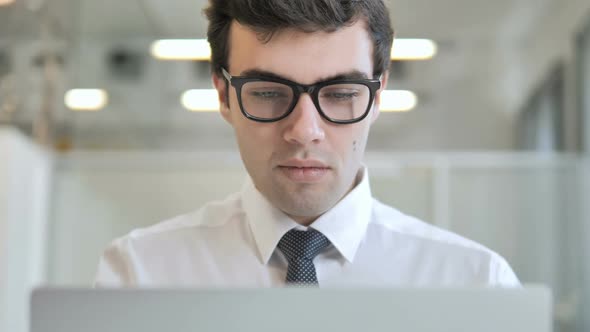 Excited Businessman Celebrating Success Frontal View