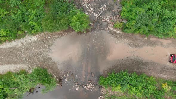 Aerial Shot of Man Driving Quad Bike