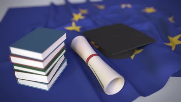 Graduation Cap and Diploma on the Flag of the EU