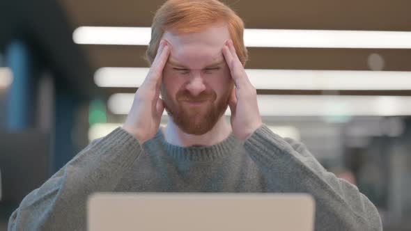 Portrait of Man Having Headache While Using Laptop