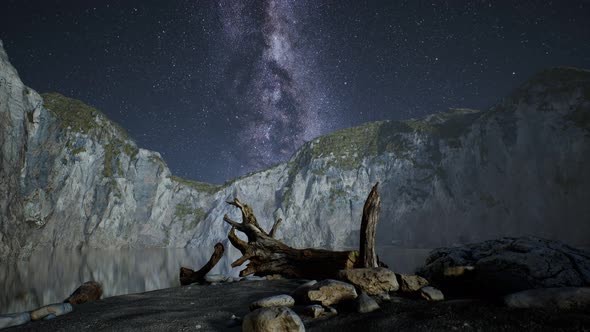 Hyperlapse of Night Starry Sky with Mountain and Ocean Beach in Lofoten Norway