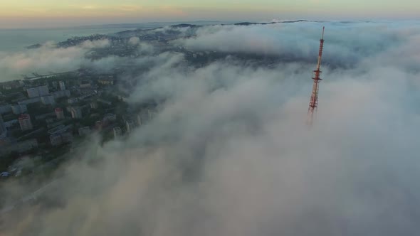 View From a Drone of the Bridge the Fog That Spreads Over the Ground