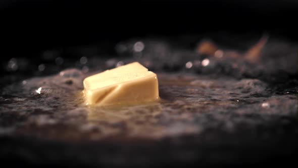 Super Slow Motion in the Pan Melts a Piece of Butter