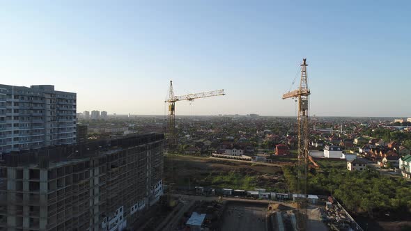 Aerial Photography Construction Cranes in the Background of the City