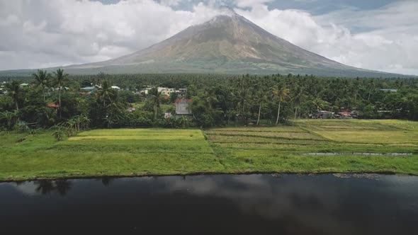 Tropic Rural City at Palm Trees Aerial, Mayon Volcano Countryside with Cottages, Lodges and Fields