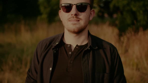 Trendy Hunk in Sunglasses Portrait