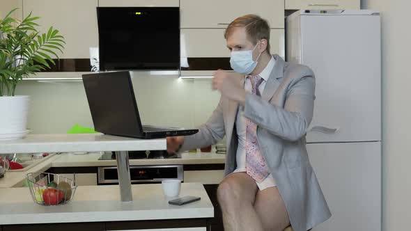 Quarantine. Businessman Working on Laptop at Home Office. Coronavirus