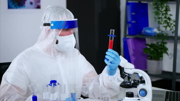 Chemist Conducting Research in Laboratory