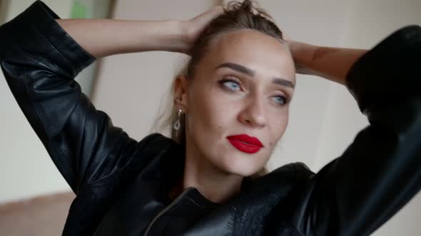 Sexy Blue Eyed Woman with Red Lips is Posing in Studio Emotional Portrait of Beautiful Lady