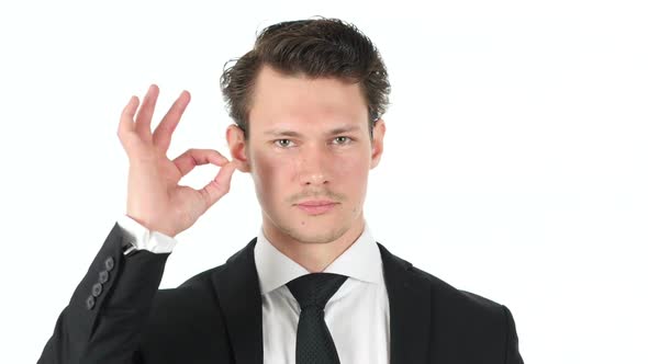 Okay Sign By Young Businessman on White Background