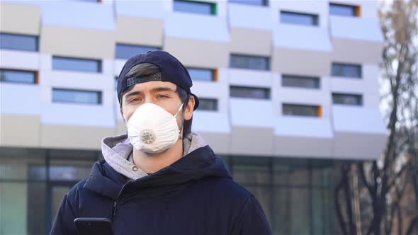 Man Wearing Protective Mask Against Transmissible Infectious Diseases