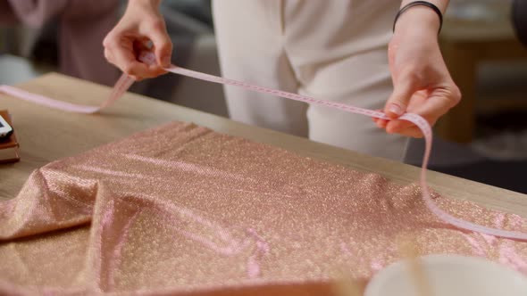 Beautiful Young Woman Fashion Designer Working in Her Living Room Studio on a New Dress