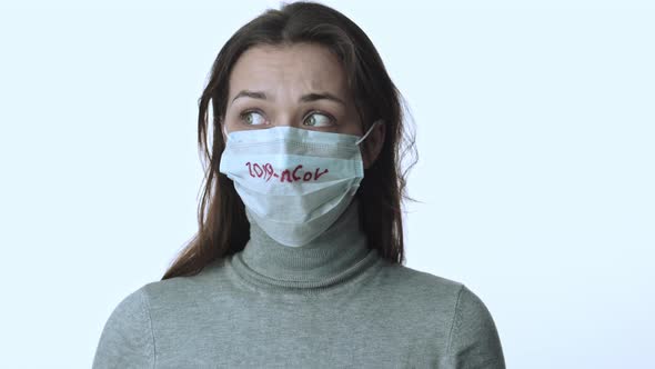 Girl in Protective Mask Afraid of Coronavirus Pandemic Nervously Looks Around