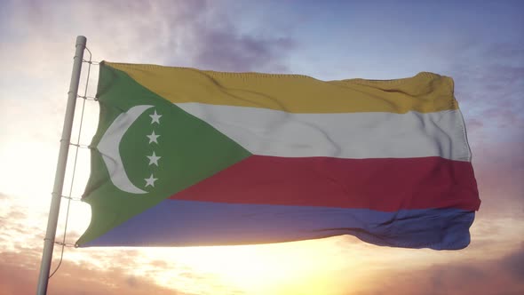 Flag of Comoros Waving in the Wind Sky and Sun Background