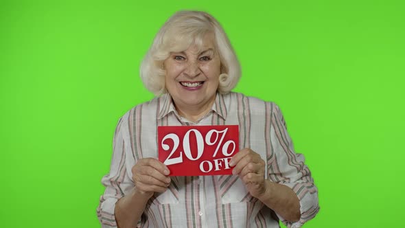 Smiling Grandmother Showing 20 Percent Off Inscription Signs, Rejoicing Good Discounts, Low Prices