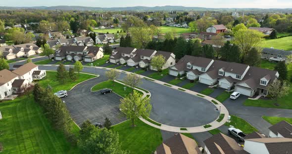 Townhouses in USA. Aerial in spring reveals large rental unit complex in suburban America.