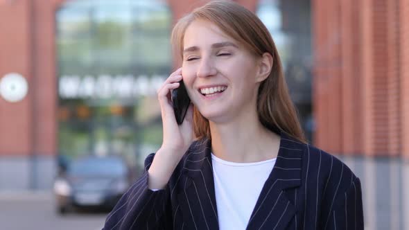 Portrait of Business Woman Talking on Phone