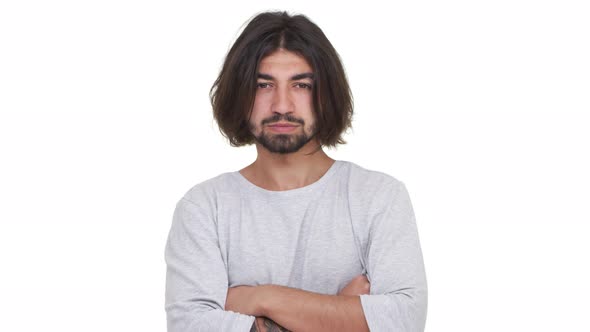Strict Annoyed Guy Standing Isolated Over White Background