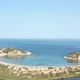 Aerial drone video of semicircular sandy beach and lagoon of Voidokilia - VideoHive Item for Sale