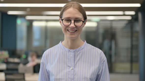 Portrait of Young Woman Talking on Online Video Call