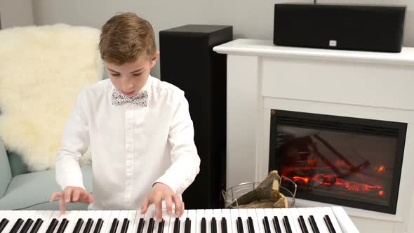 Teenager Playing a Piano Partiture