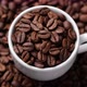 Coffee cup. Coffee beans in white cup and on background - VideoHive Item for Sale