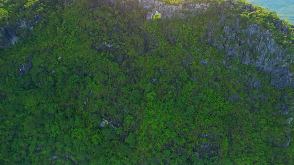 A drone is flying over "Khao Thalu"