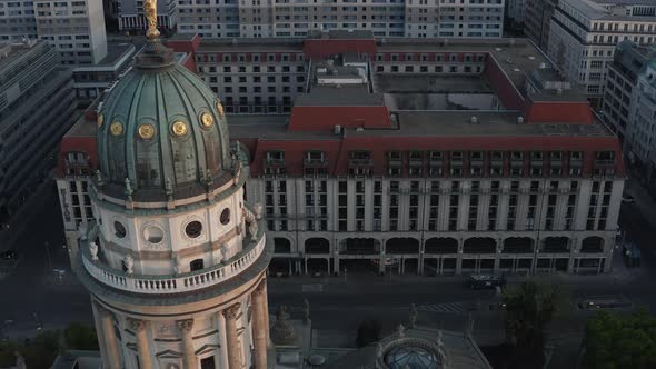 AERIAL: Berlin Gendarmenmarkt German Church Tower Close Up at Dusk