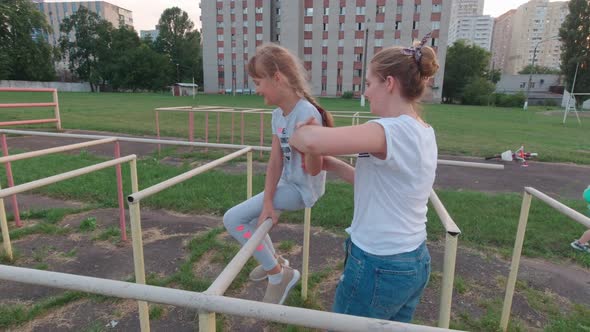 Family On Horizontal Bars