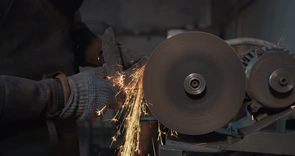 Grinding Ax During Its Creation