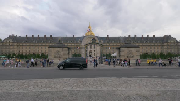 Entry gates of Les Invalides with people walking in and out Paris, France