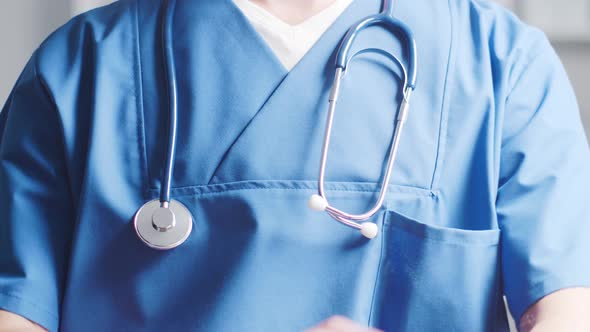 Close-up of professional medical doctor working in hospital office, Medical concept.