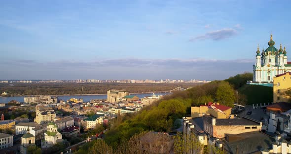 Aerial View Kyiv Cityscape Left Bank Dnipro River at Beautiful Sunset or Sunrise