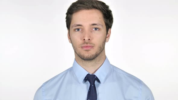 Young Businessman Shaking Head to Reject on White Background