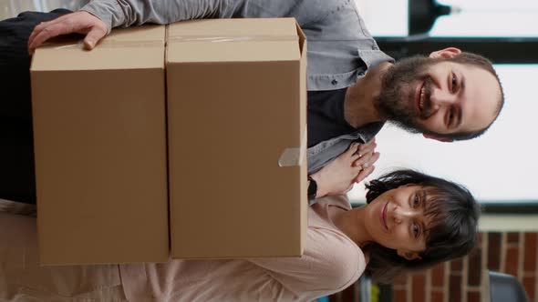 Vertical Video Portrait of Life Partners Buying House on Loan to Move in