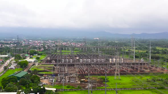 Aerial View of a High Voltage Substation. Flying Over Power Station.