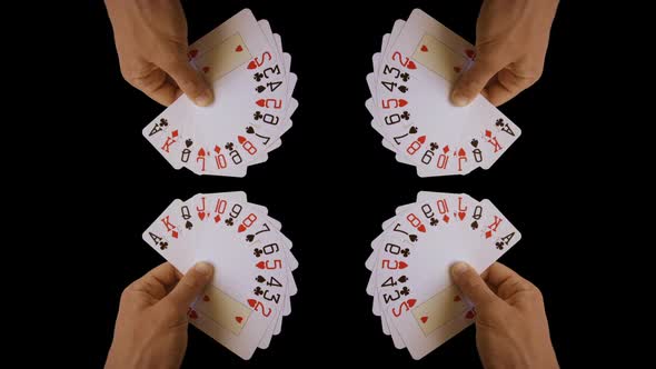 Hand holding cards at casino gambling