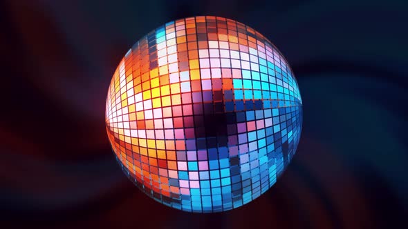 Multi-colored disco ball rotates in space