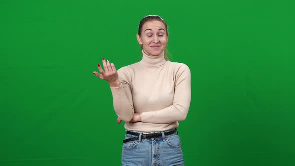 Sceptic Woman Showing are you Nuts Gesture Looking at Camera