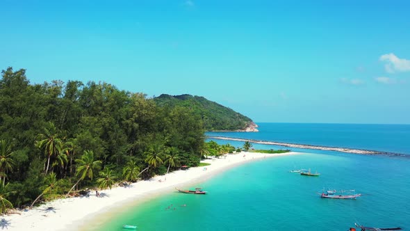 Tropical sandy beach with turquoise calm sea in Thailand. Malibu beach, Koh Phangan island