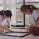 Asian Woman And Daughter Move To New Home Assembling Furniture Together, Daughter Helps Mother. - VideoHive Item for Sale