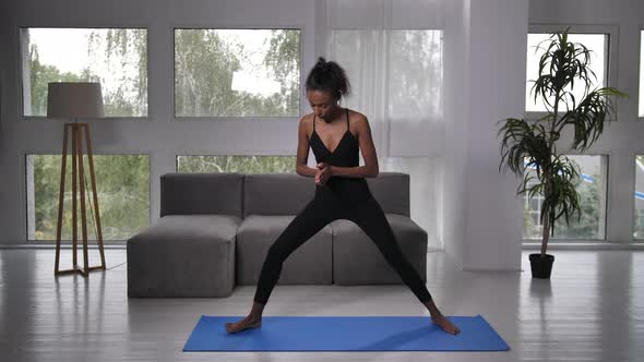 Fit Woman Trainer Practicing Yoga Via Video Chat