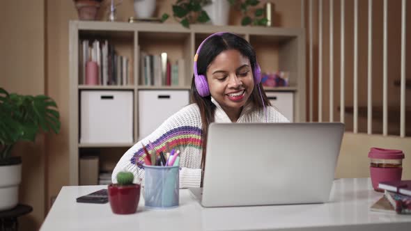 African American Teenager Student Learning Doing Online Video Call with Friend or Teacher From Home