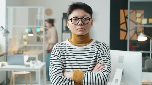 Time Lapse of Asian Businesswoman Standing in Office