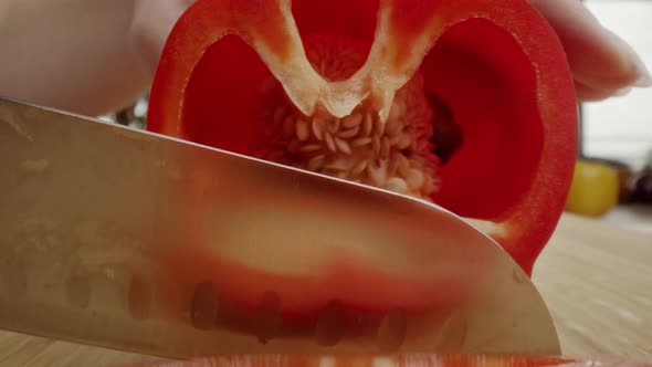 Zoom out macro video of cut red pepper. Shot with RED helium camera in 8K