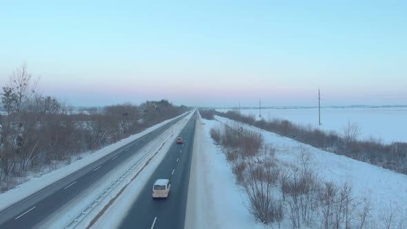 Cars On Winter Road Aerial