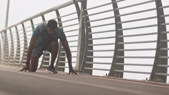 African-American Sprinter Training Outdoors